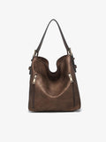 The Alexa 2-in-1 Hobo Bag offers both style and functionality. It features dual zip compartments, including concealed carry pockets for added security. The adjustable buckle shoulder strap ensures a comfortable fit, while the magnetic snap closure provides easy access to your belongings. Additionally, the inner bag with slip and zip pockets offers organized storage, and the adjustable/removable crossbody strap adds versatility to your carrying options.